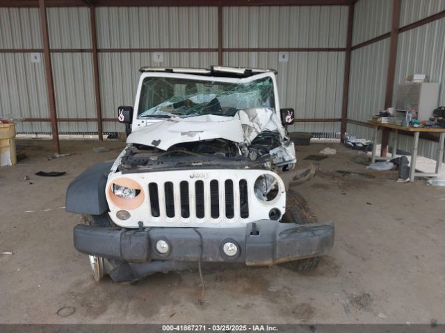 1C4AJWAG5FL705223 Jeep Wrangler Sport