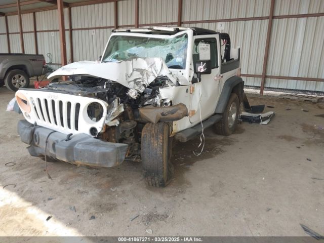 1C4AJWAG5FL705223 Jeep Wrangler Sport