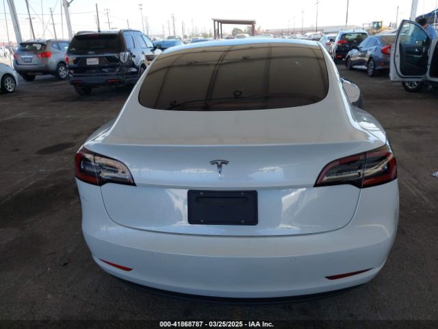 5YJ3E1EA1MF997104 Tesla Model 3 Standard Range Plus Rear-wheel Drive