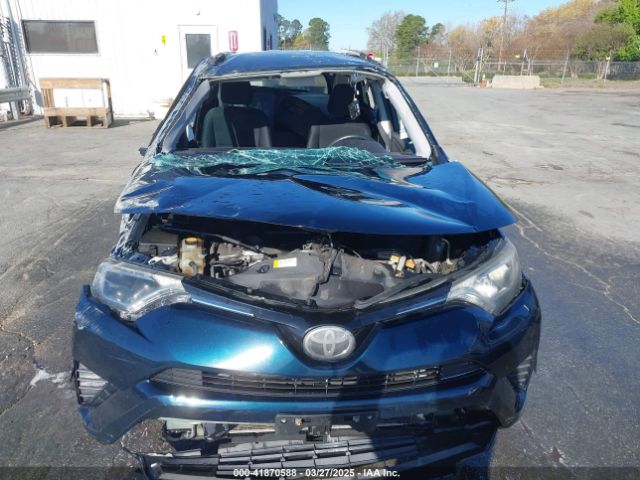 2T3ZFREV7JW463118 Toyota RAV4 LE