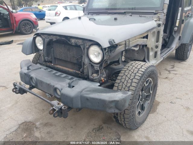 1C4BJWDG7EL244749 Jeep Wrangler Unlimited Sport