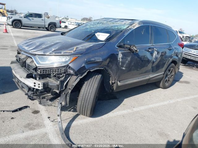 2017 HONDA CR-V 2HKRW2H9XHH670836 Photo 1