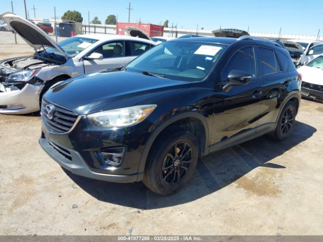 JM3KE2CY8G0832209 Mazda Cx-5 Touring