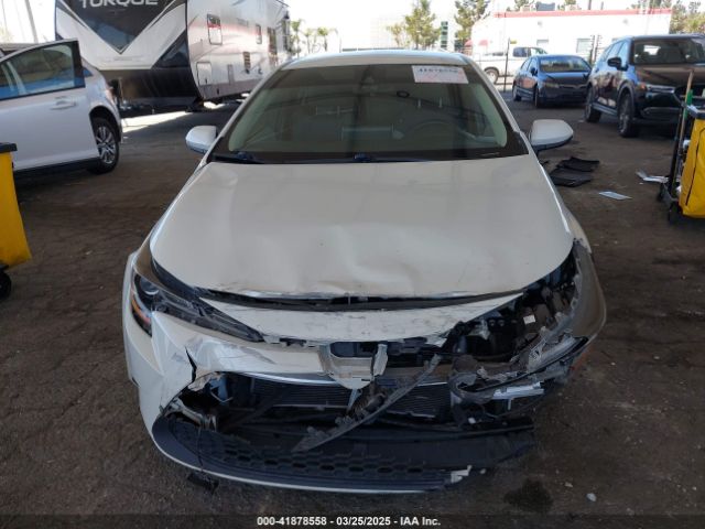 JTDEAMDE2MJ010982 Toyota Corolla Hybrid Le