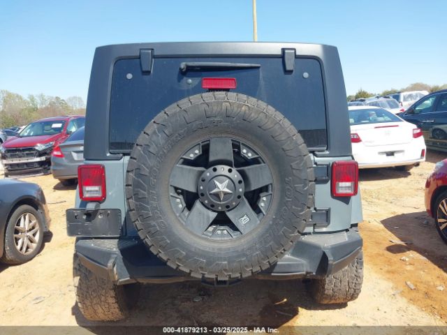 1C4HJWEG3EL306155 Jeep Wrangler Unlimited Sahara