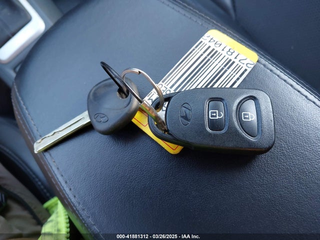 KM8JU3AG5EU800438 Hyundai TUCSON SE