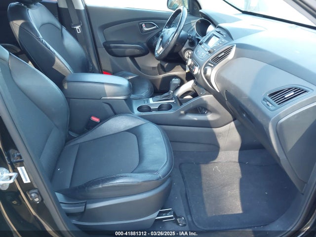 KM8JU3AG5EU800438 Hyundai TUCSON SE
