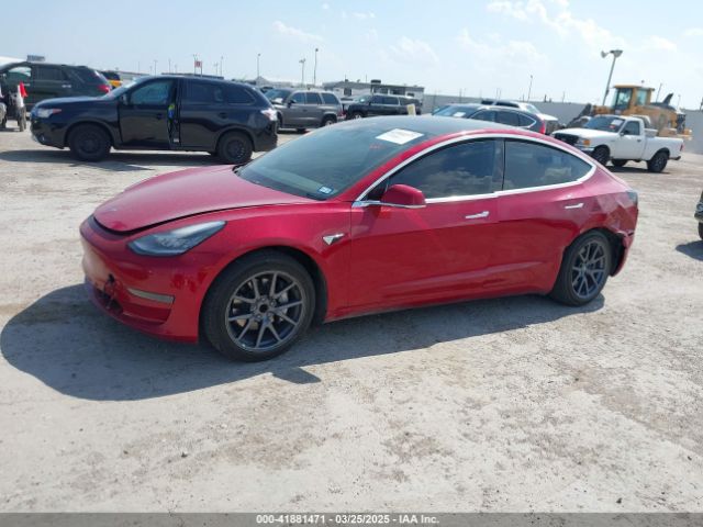 5YJ3E1EAXKF411495 Tesla 2019