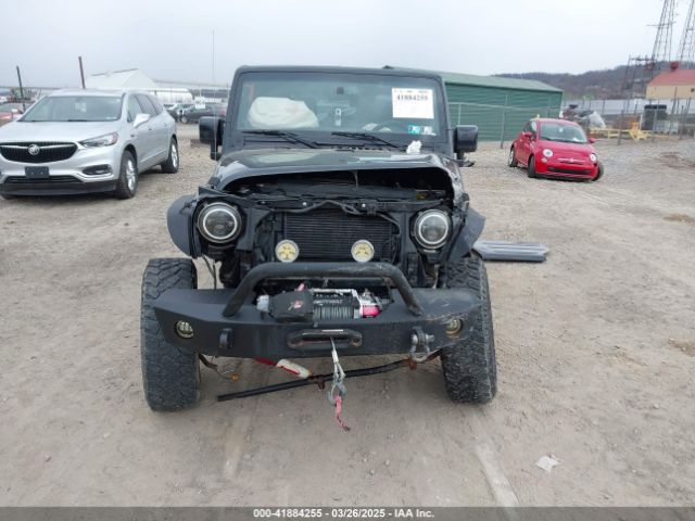 1C4AJWBG9EL311477 Jeep Wrangler Altitude