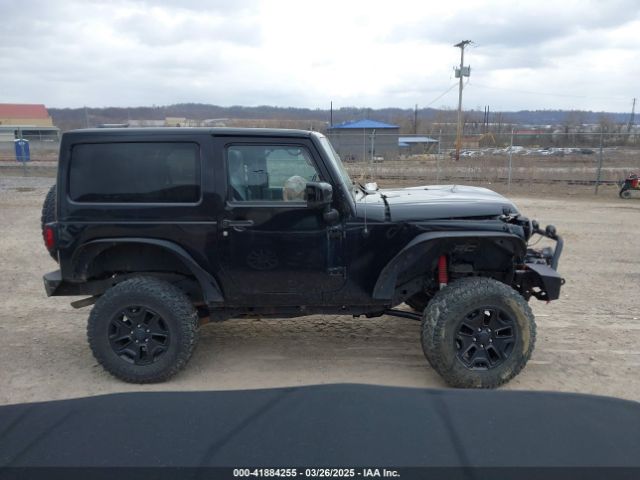 1C4AJWBG9EL311477 Jeep Wrangler Altitude