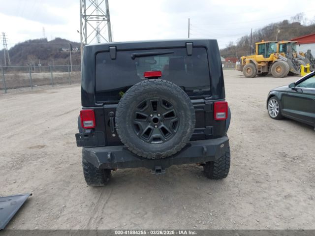 1C4AJWBG9EL311477 Jeep Wrangler Altitude