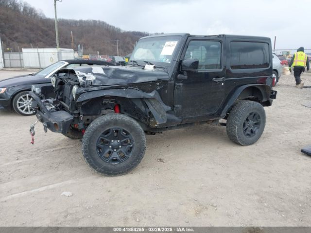 1C4AJWBG9EL311477 Jeep Wrangler Altitude