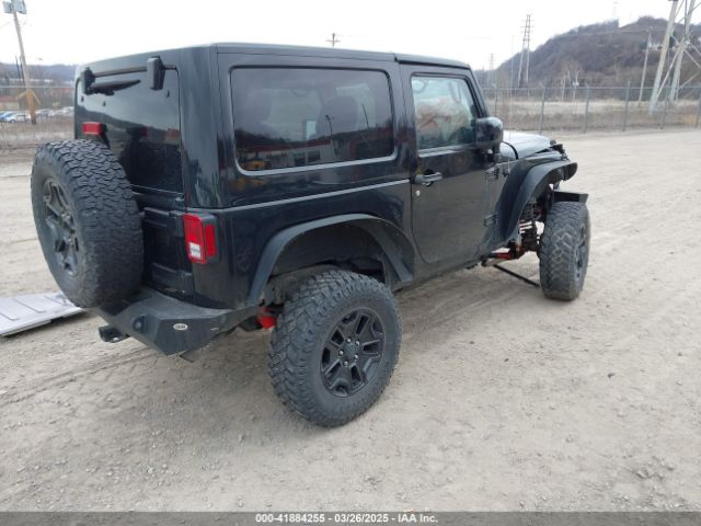 1C4AJWBG9EL311477 Jeep Wrangler Altitude