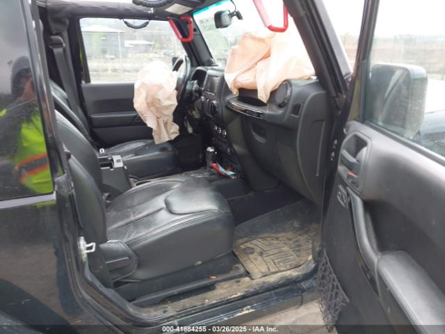 1C4AJWBG9EL311477 Jeep Wrangler Altitude