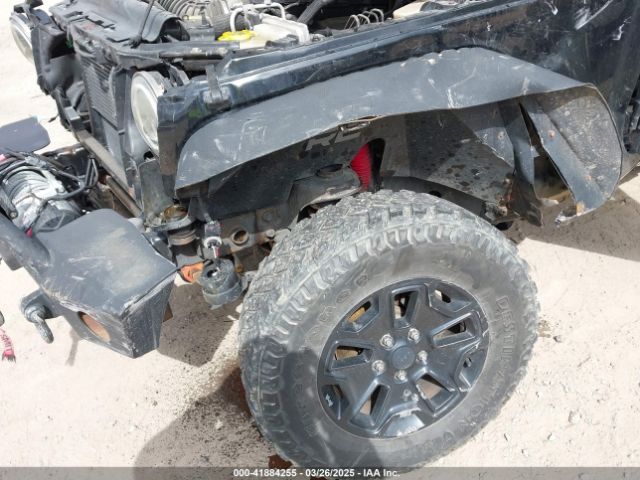 1C4AJWBG9EL311477 Jeep Wrangler Altitude