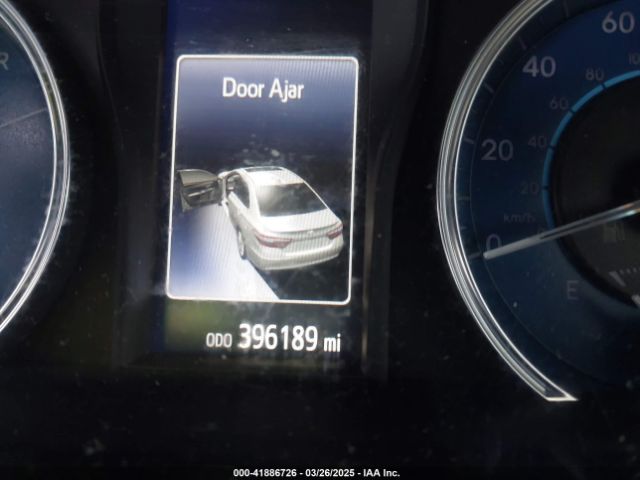 4T1BD1FK3FU164092 Toyota Camry Hybrid Le