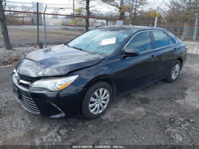4T1BD1FK3FU164092 Toyota Camry Hybrid Le