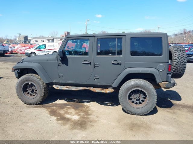 1C4HJWDG6EL187065 Jeep Wrangler Unlimited Freedom Edition