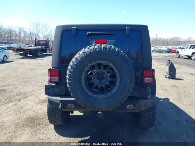 1C4HJWDG6EL187065 Jeep Wrangler Unlimited Freedom Edition