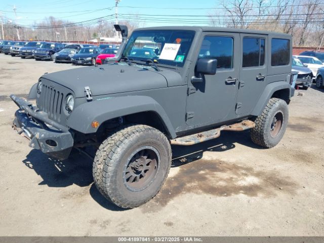 1C4HJWDG6EL187065 Jeep Wrangler Unlimited Freedom Edition