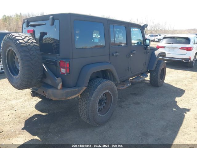 1C4HJWDG6EL187065 Jeep Wrangler Unlimited Freedom Edition