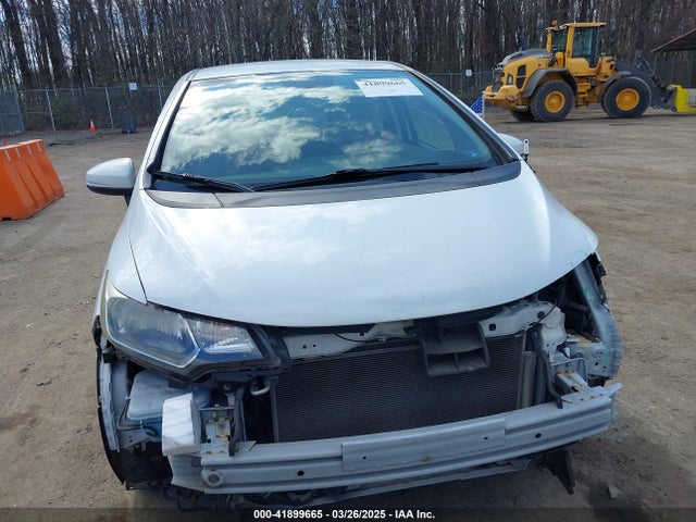 JHMGK5H59GX007518 Honda FIT LX