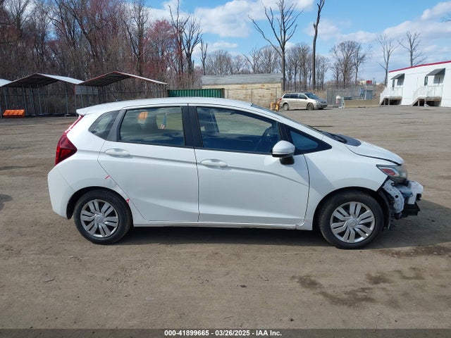 JHMGK5H59GX007518 Honda FIT LX