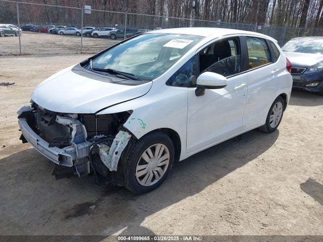 JHMGK5H59GX007518 Honda FIT LX