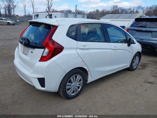 JHMGK5H59GX007518 Honda FIT LX