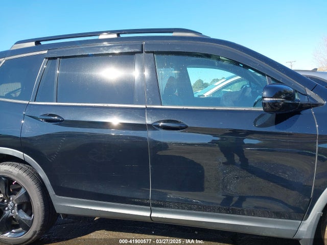 5FNYF8H01KB006754 Honda Passport Elite