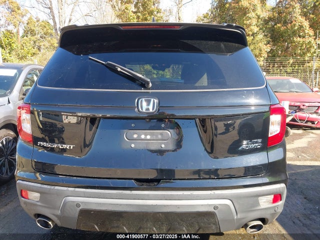 5FNYF8H01KB006754 Honda Passport Elite