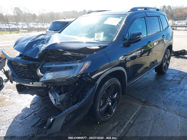 5FNYF8H01KB006754 Honda Passport Elite