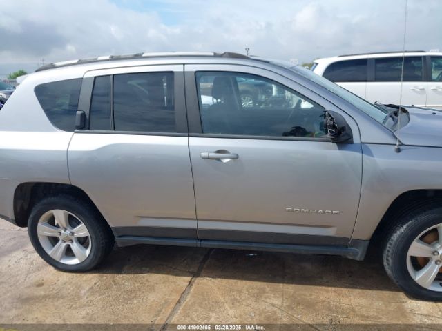 1C4NJCBA2GD600516 Jeep Compass Sport