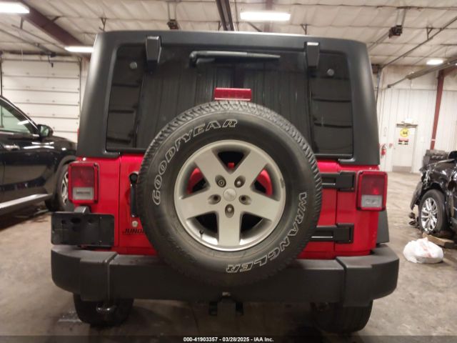 1C4HJWDG9GL308299 Jeep Wrangler Unlimited Sport