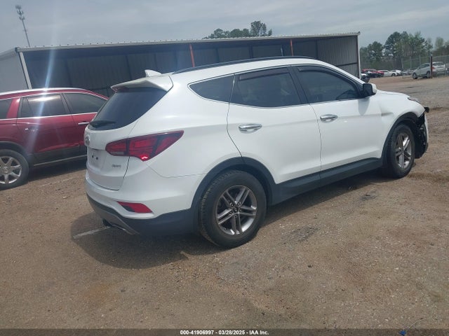 5NMZU3LB4HH026378 Hyundai Santa Fe Sport 2.4l