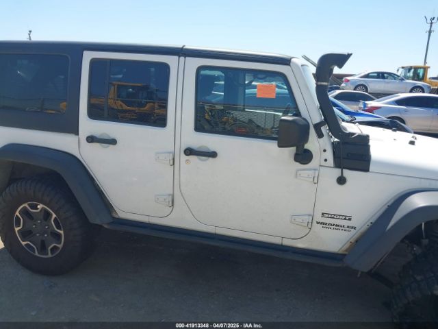 1C4BJWDG1EL121190 Jeep Wrangler Unlimited Sport