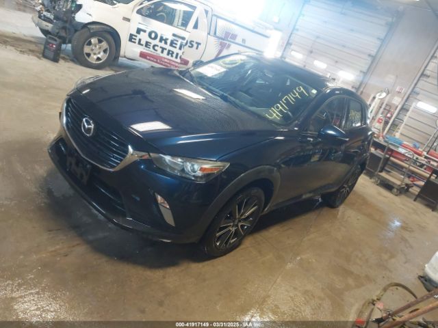 JM1DKFC72H0145267 Mazda Cx-3 Touring