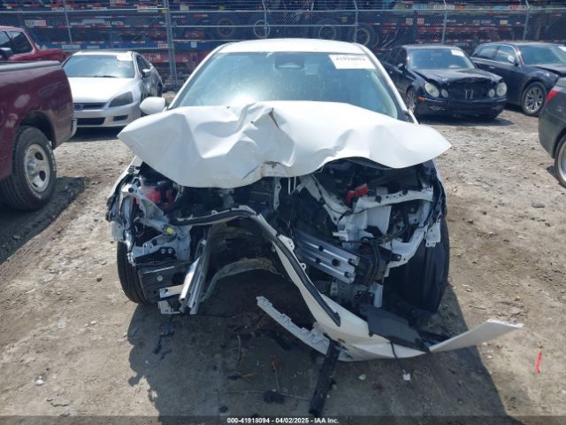 JTDBCMFE2R3063977 Toyota Corolla Hybrid Le