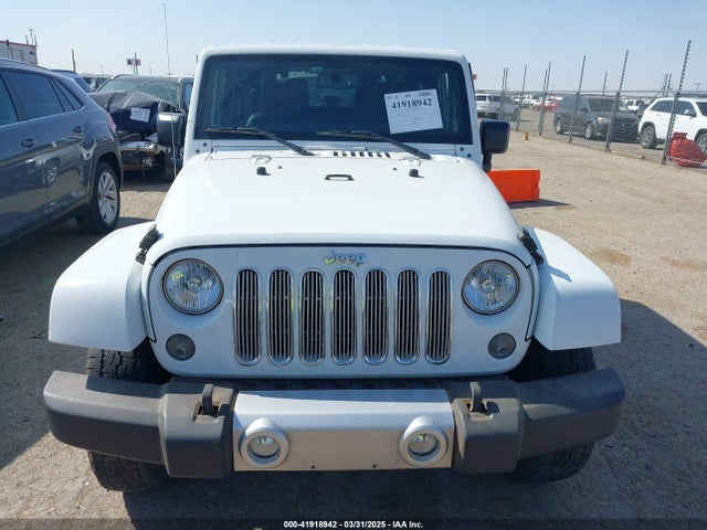 1C4AJWBG1FL581272 Jeep Wrangler Sahara