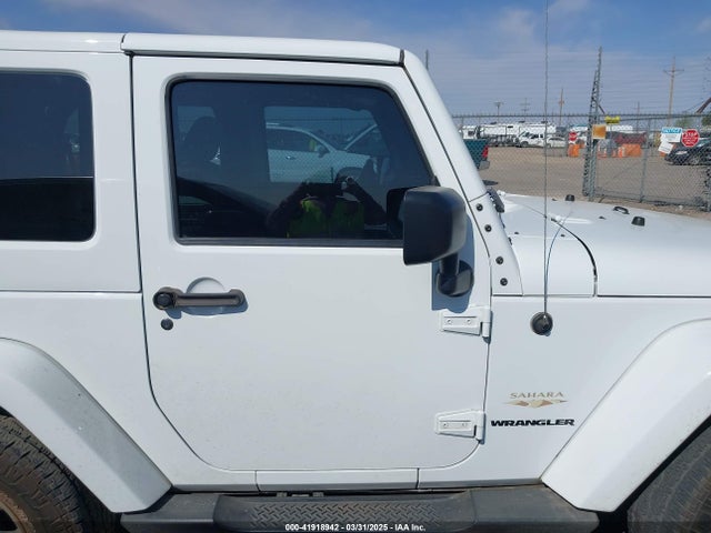 1C4AJWBG1FL581272 Jeep Wrangler Sahara