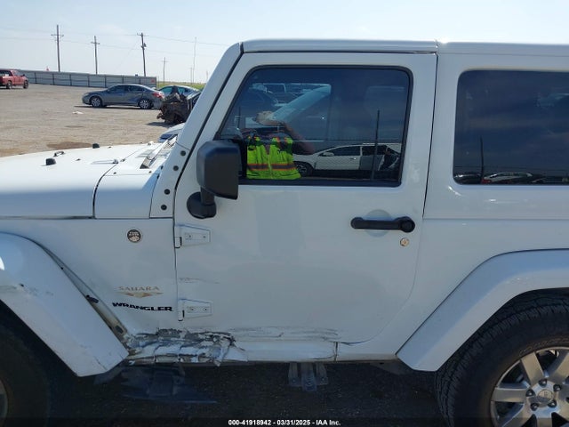 1C4AJWBG1FL581272 Jeep Wrangler Sahara
