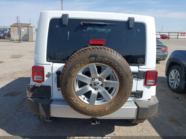 1C4AJWBG1FL581272 Jeep Wrangler Sahara
