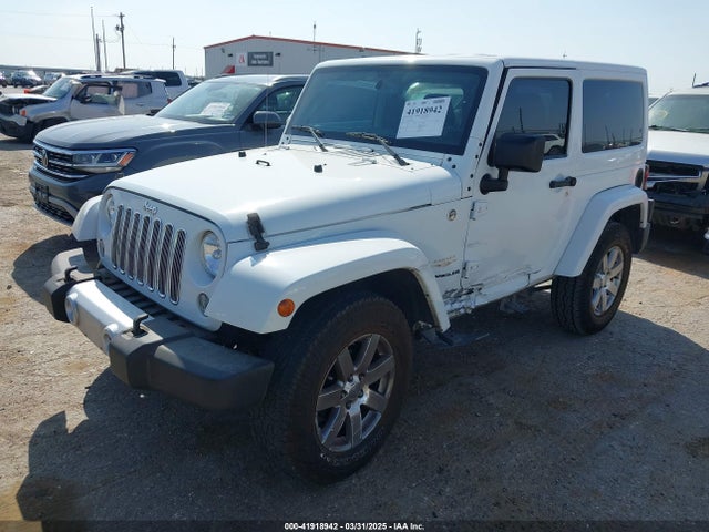 1C4AJWBG1FL581272 Jeep Wrangler Sahara