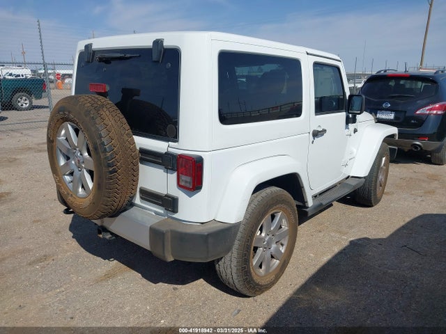 1C4AJWBG1FL581272 Jeep Wrangler Sahara
