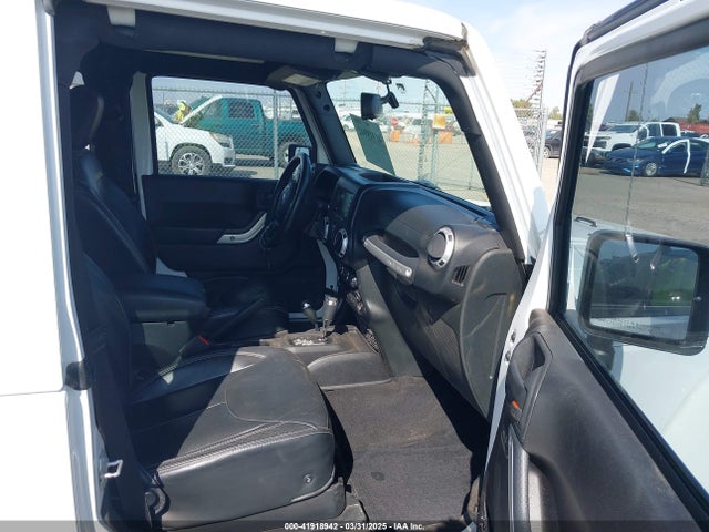 1C4AJWBG1FL581272 Jeep Wrangler Sahara
