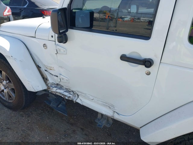 1C4AJWBG1FL581272 Jeep Wrangler Sahara