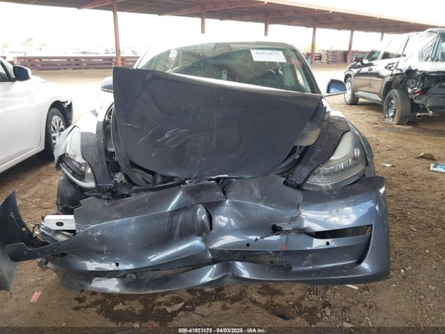 5YJ3E1EC0LF640965 Tesla 2020