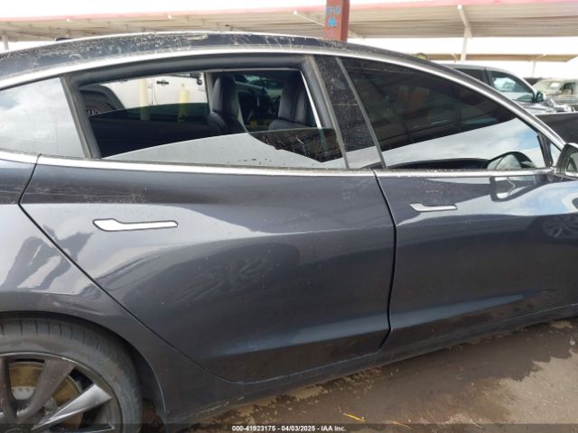 5YJ3E1EC0LF640965 Tesla 2020