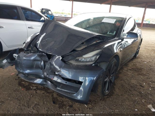 5YJ3E1EC0LF640965 Tesla 2020