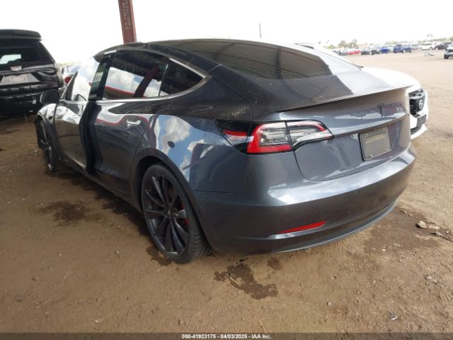 5YJ3E1EC0LF640965 Tesla 2020